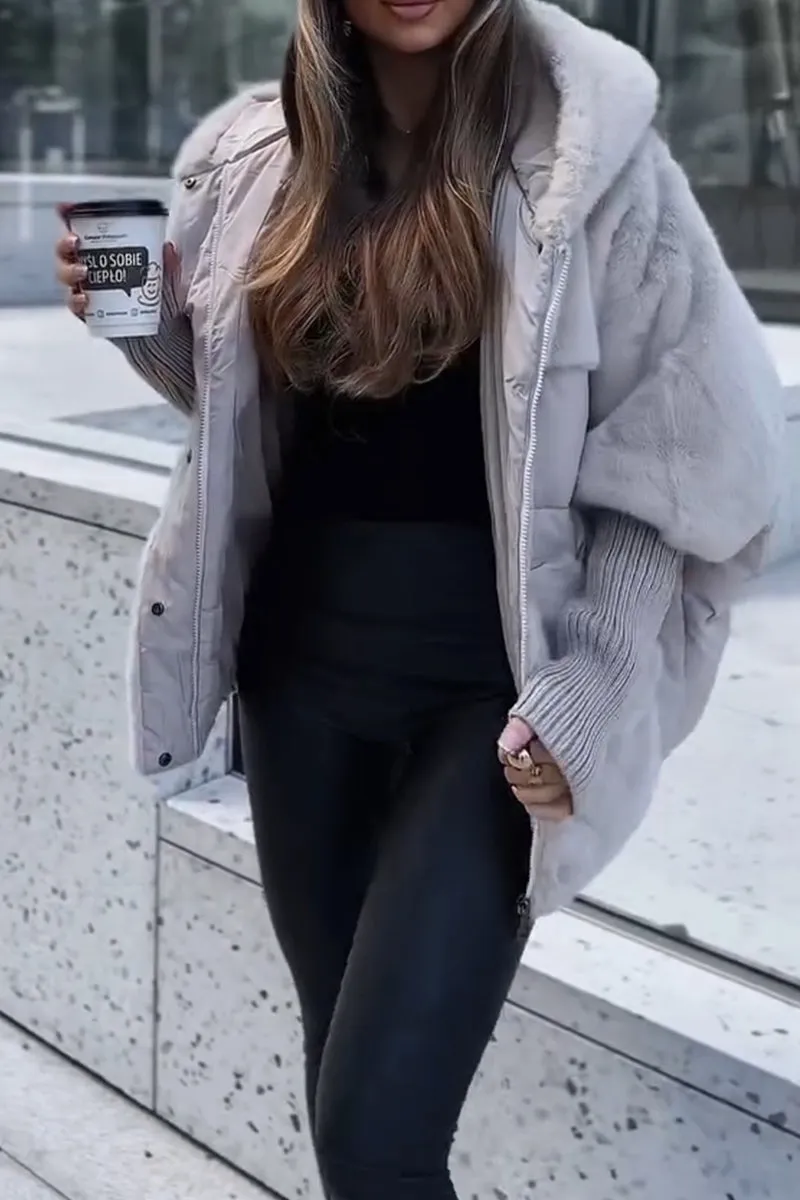 Homixa women's hooded bomber jacket from the Layla Edit with a sleek design and stylish fit, shown in a modern, casual setting.