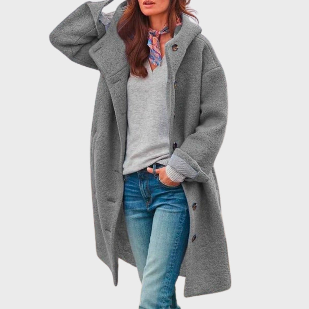 Homixa women's trench coat from the Layering Style Remy Edit, showing a classic beige trench coat with a belted waist and collar.