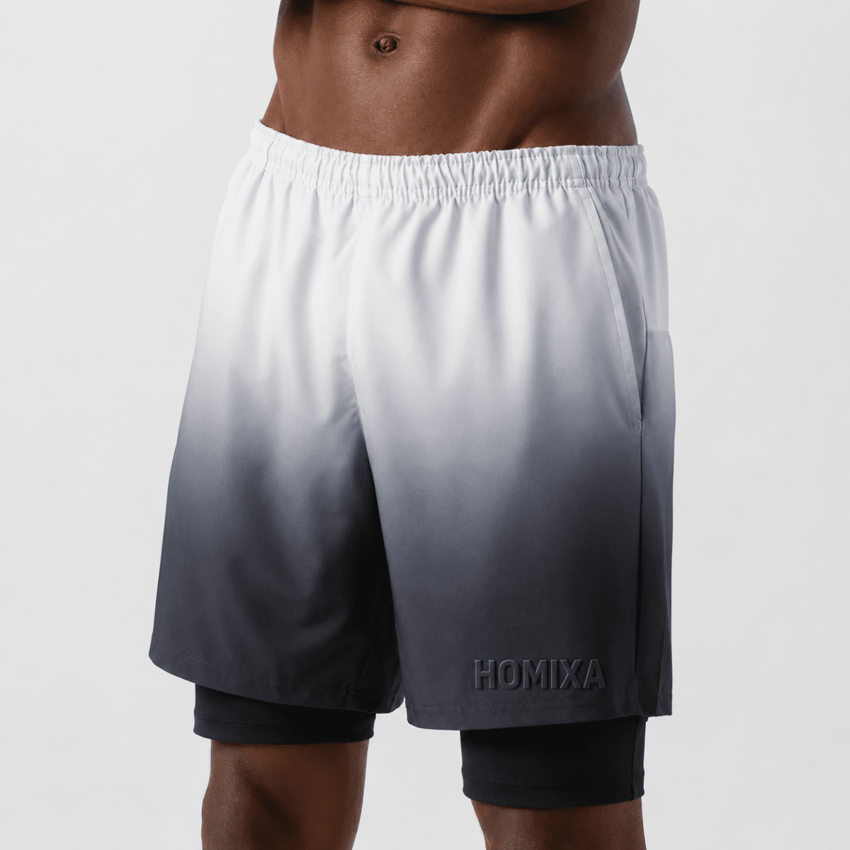 Homixa men's 2-in-1 gradient performance shorts in gray and white with adjustable waistband and breathable fabric.
