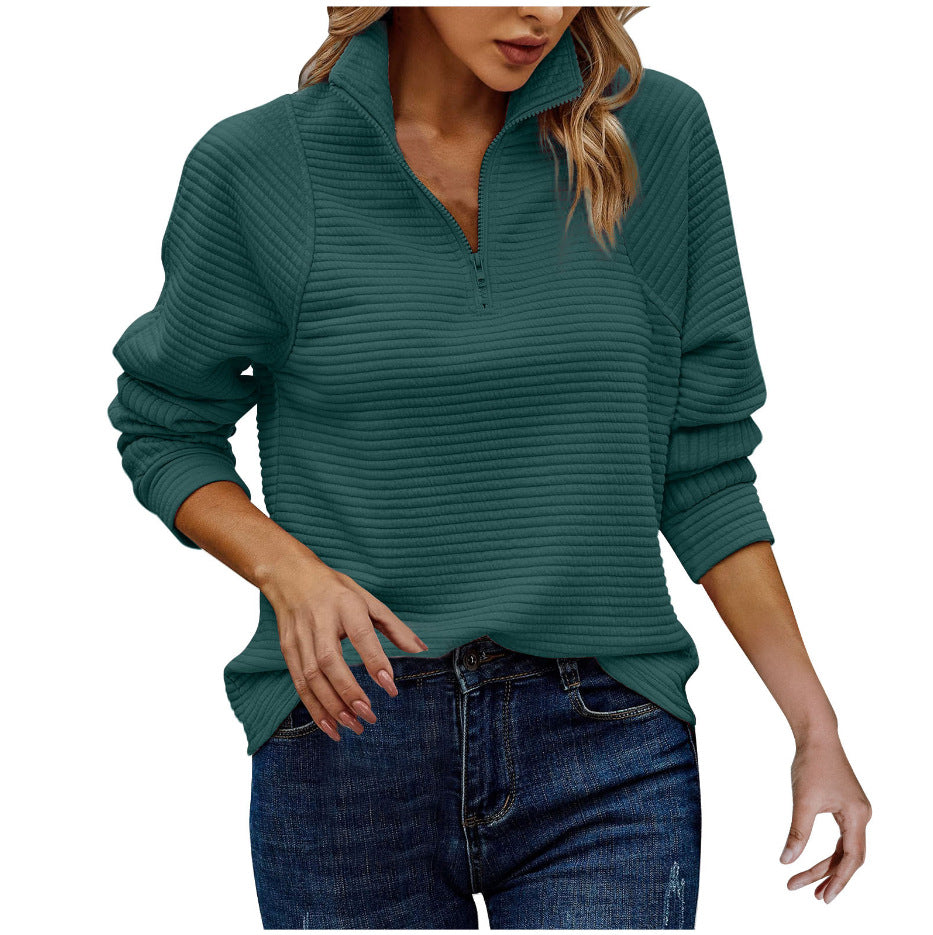 Homixa women's knit sweater with ribbed details and quarter-zip, shown in a cozy fit on a model.