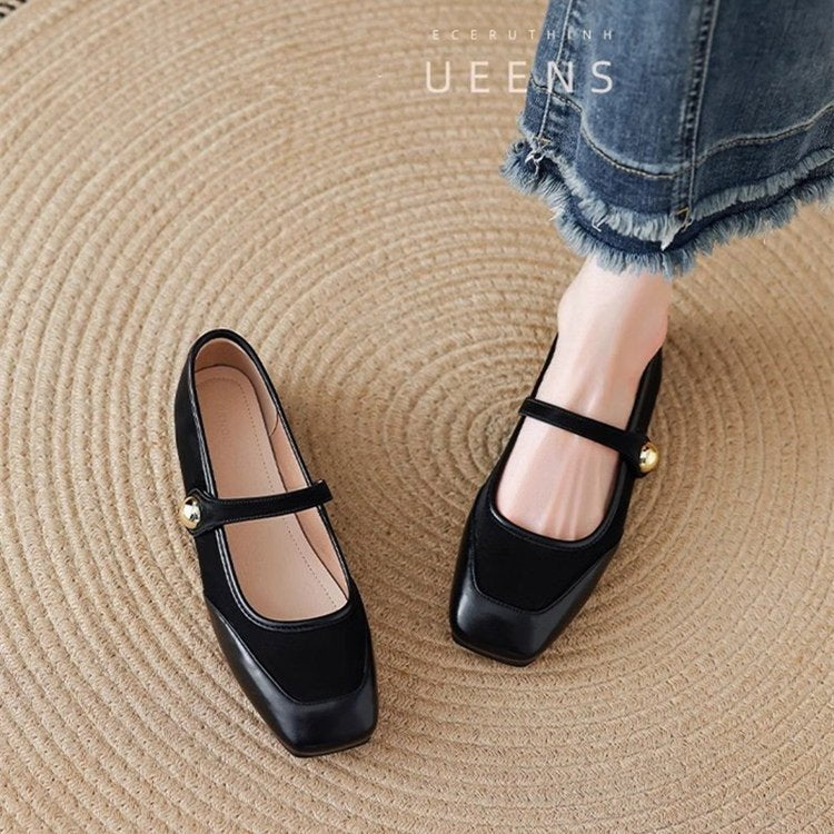 Homixa women's Mary Jane shoes with relaxed fit and buckle detail, featuring classic black leather and stylish design.