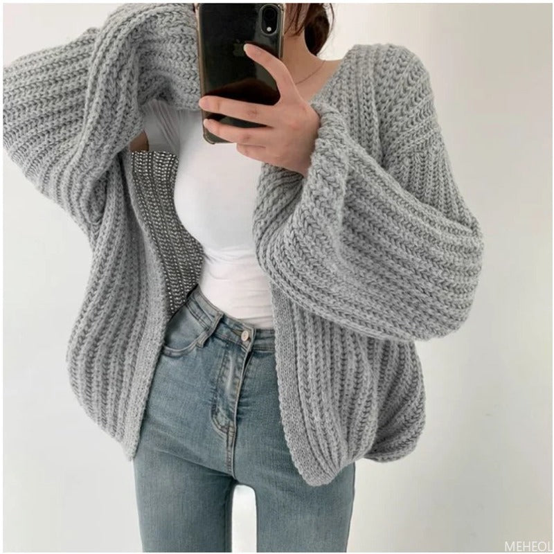 Homixa chunky-knit women's cardigan with a cozy, textured knit design, featuring a relaxed fit and long sleeves.