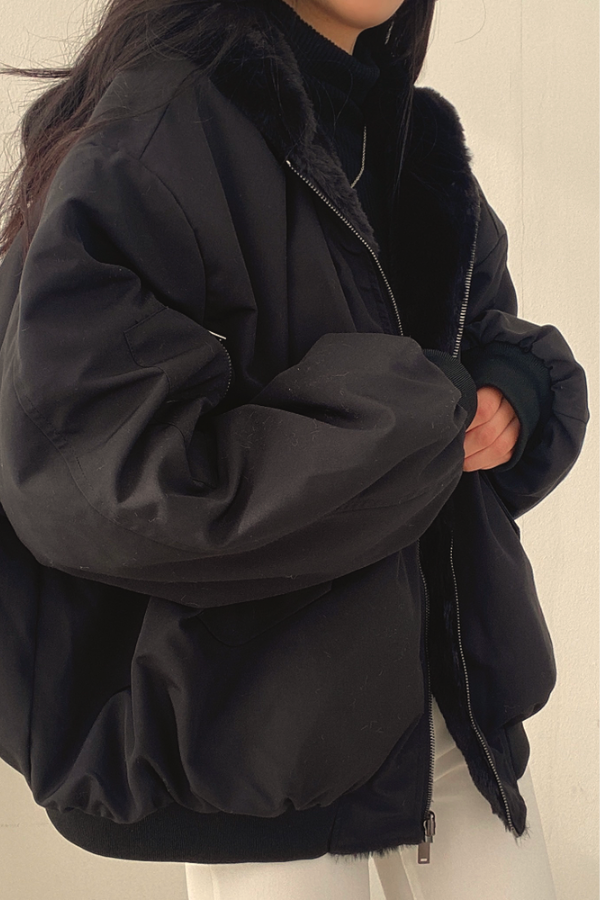 Homixa oversized women's bomber jacket with faux fur hood and relaxed fit, suitable for winter and casual wear.
