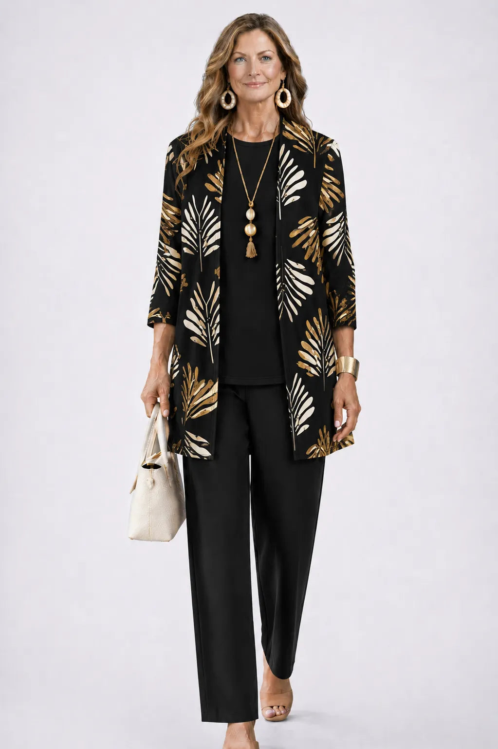Women's botanical-print 3-piece wide-leg pant set by Homixa, featuring flowy pants, matching top, and coordinating accessories.