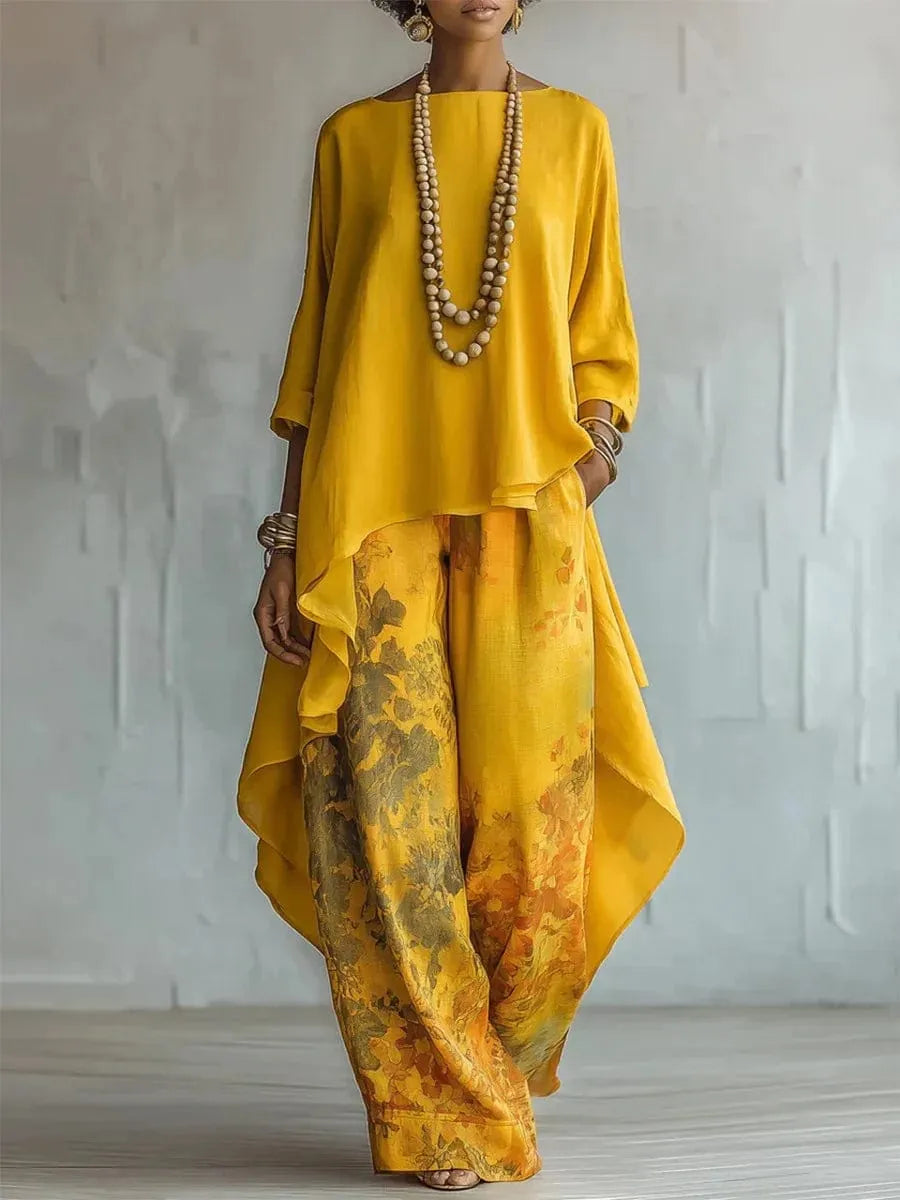 Women's asymmetric tunic and wide-leg pant set by Homixa, stylish two-piece outfit with flowing silhouettes and modern design.
