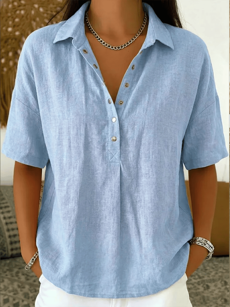 Homixa Avery women's relaxed collared shirt, soft fabric, light color, laid flat to showcase stylish collar and casual fit.