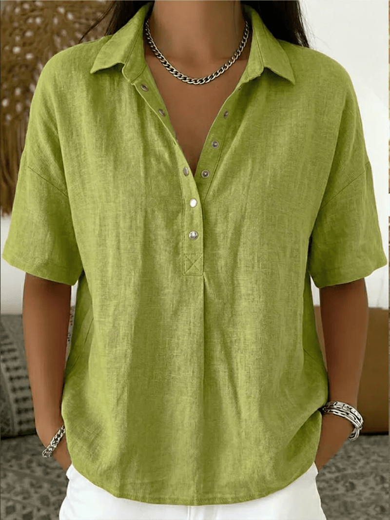 Homixa Avery women's relaxed collared shirt displayed on a model, featuring a casual fit and classic collar design.