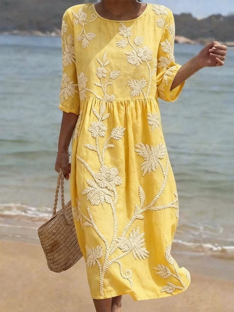 Homixa Flora women's embroidered maxi dress with intricate floral embroidery and flowing fabric, perfect for elegant occasions.