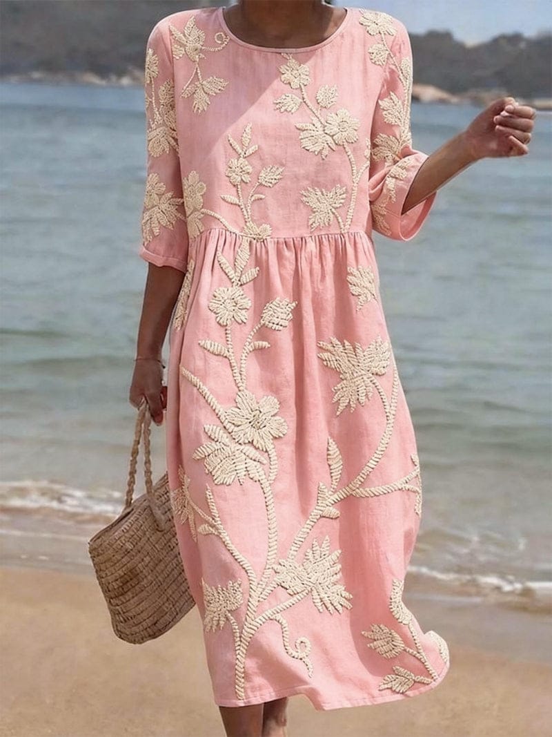 Homixa Flora women's embroidered maxi dress featuring intricate floral embroidery and flowing fabric for elegant summer wear.