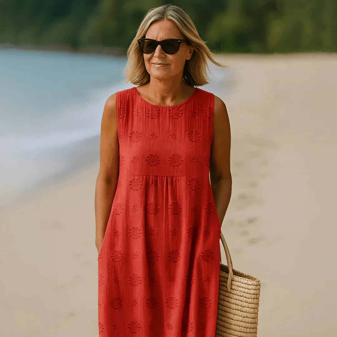 Homixa women's sleeveless pocket dress made of lightweight fabric, featuring a casual design with side pockets.