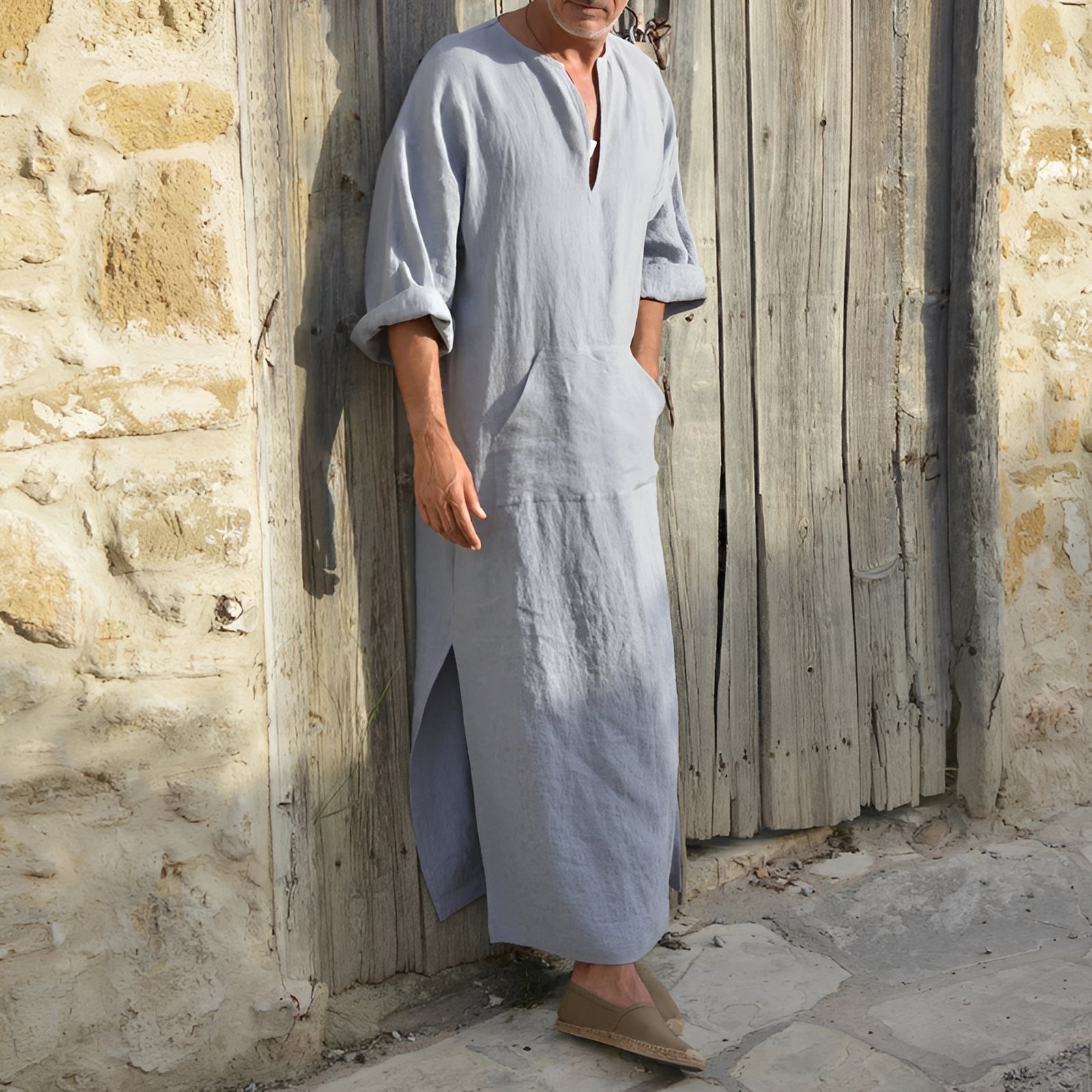 Men's minimalist long shirt dress with side slit from Mainz-Mode, featuring a sleek design and casual fit.