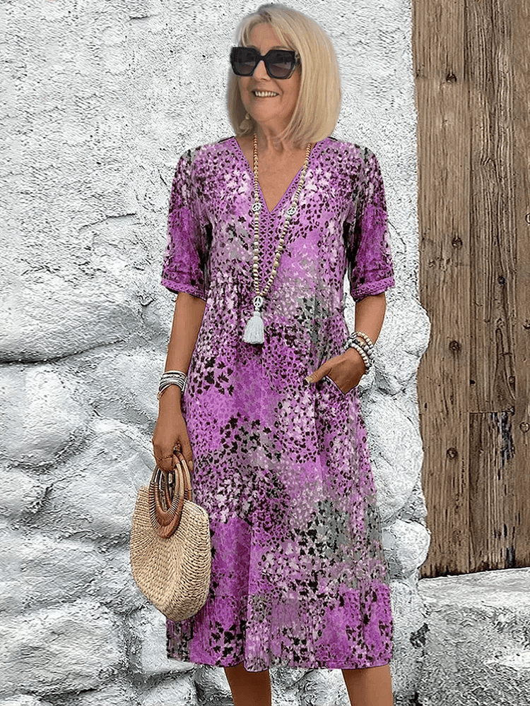 Homixa Sienna women's printed midi dress featuring a stylish pattern and flowing fabric, perfect for casual or semi-formal occasions.