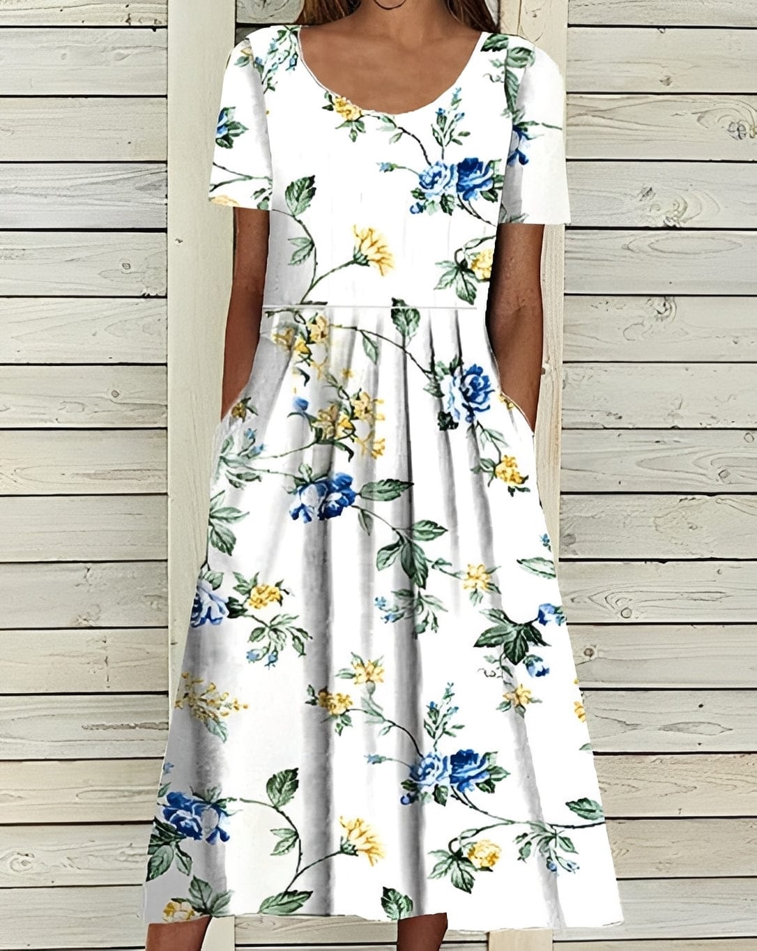 Elegant women's midi dress with floral pattern and flowing silhouette, featuring a stylish design from Mainz-Mode.