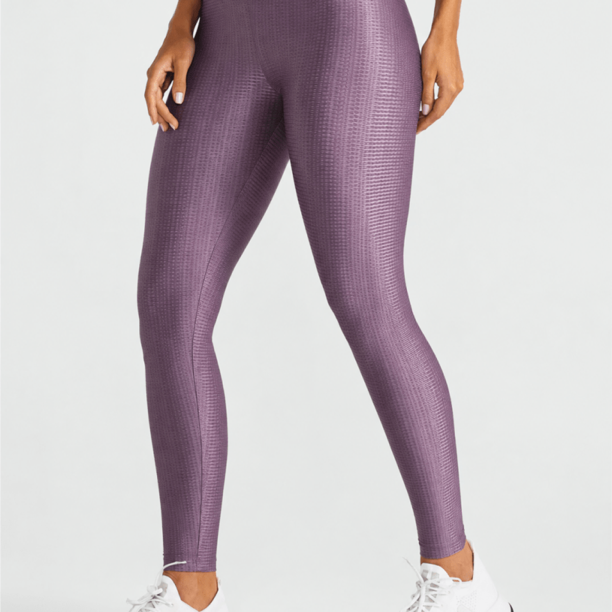 Homixa Glow Texture Women's violet purple leggings with a vibrant, glowing textured pattern on soft, stretchy fabric.