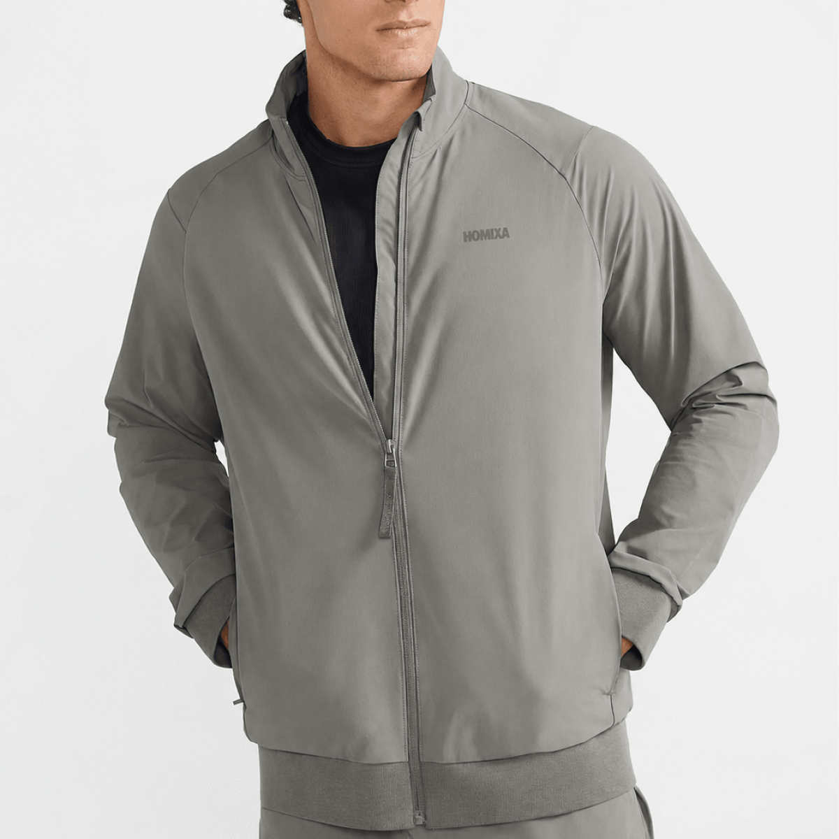 Homixa men's khaki gray sports jacket with track shield design, featuring a lightweight, athletic fit and zip closure.