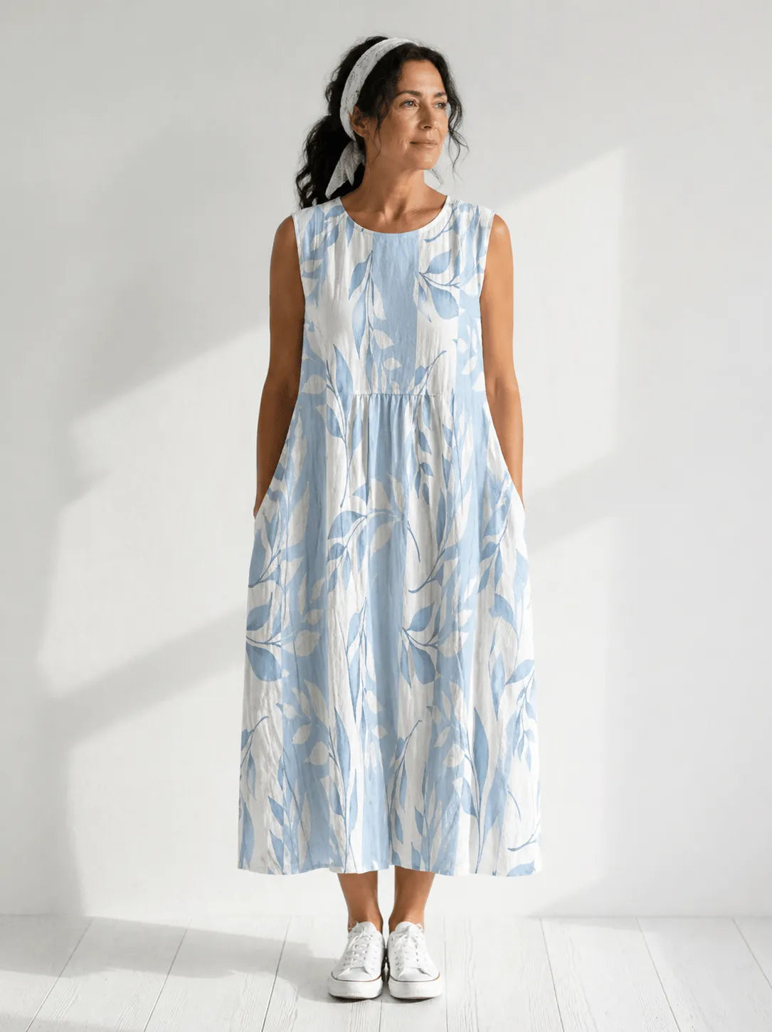 Women's leaf-print sleeveless midi dress by Homixa featuring pockets, perfect for casual and summer wear.