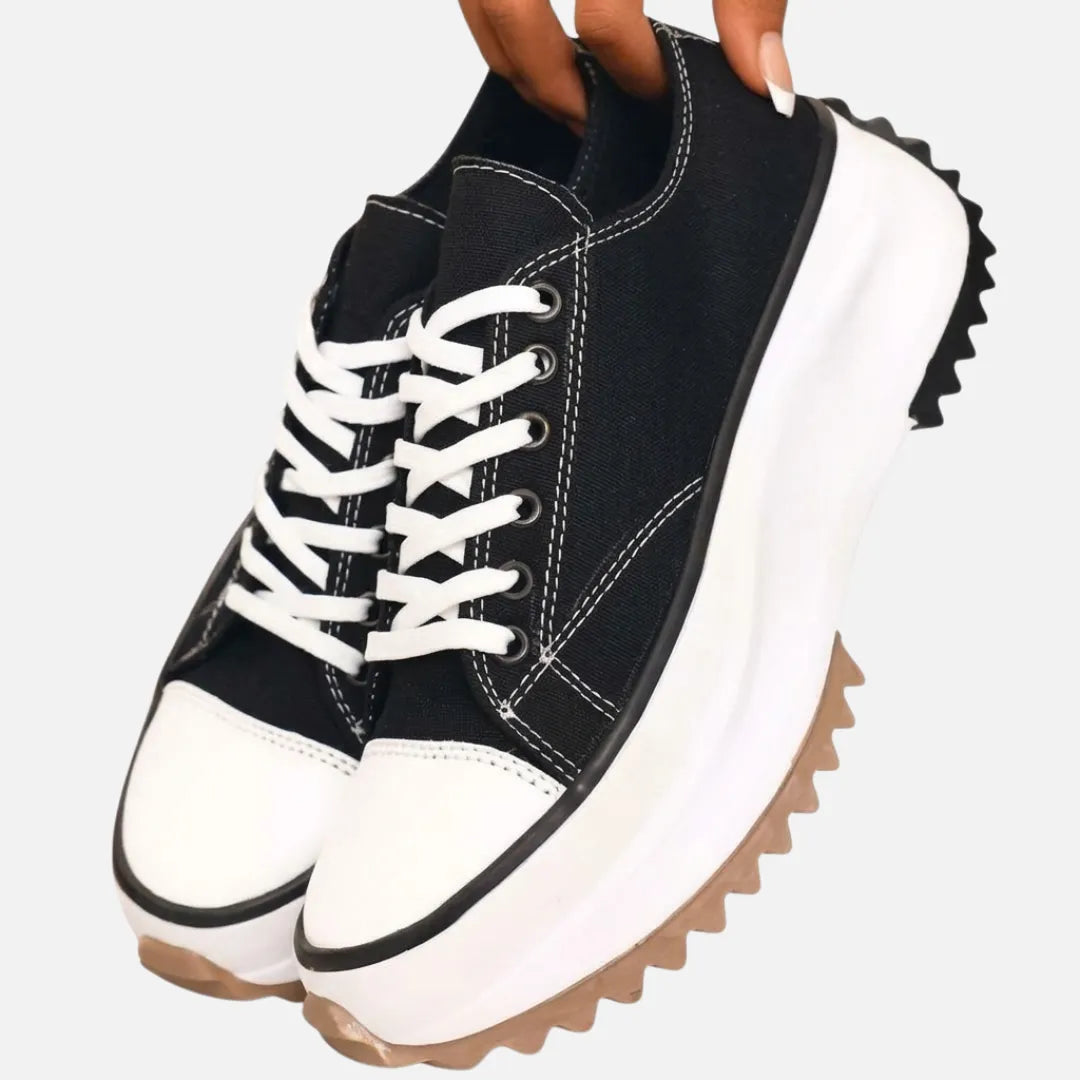 Leni women's lace-up platform sneakers by Homixa featuring white uppers and chunky rubber soles, casual and stylish footwear.