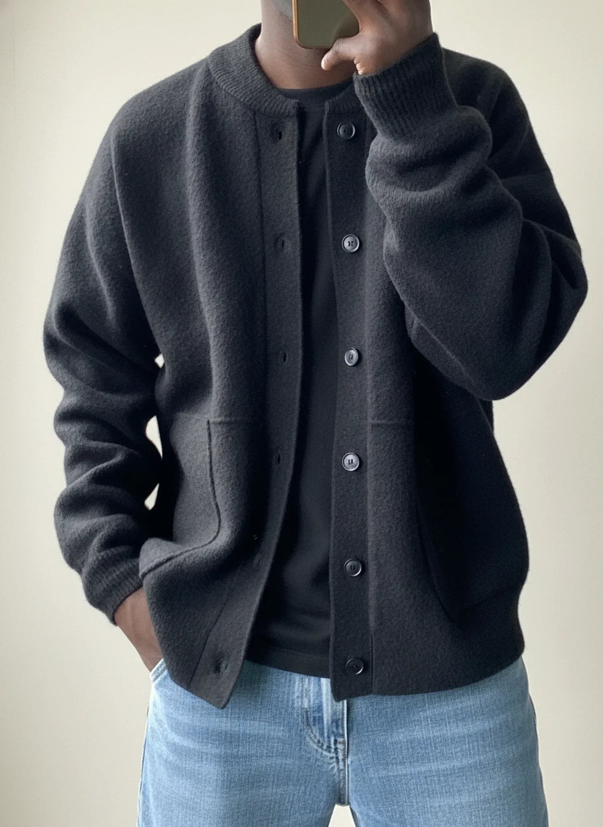 Men's casual button-front sweater jacket by Homixa with ribbed cuffs and patch pockets, styled for a relaxed look.