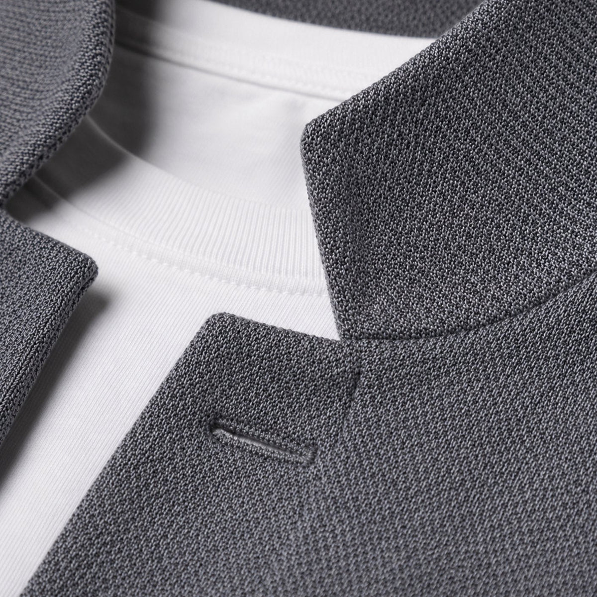 Men's textured knit cardigan jacket with stand collar, button front, and twin patch pockets from Homixa.