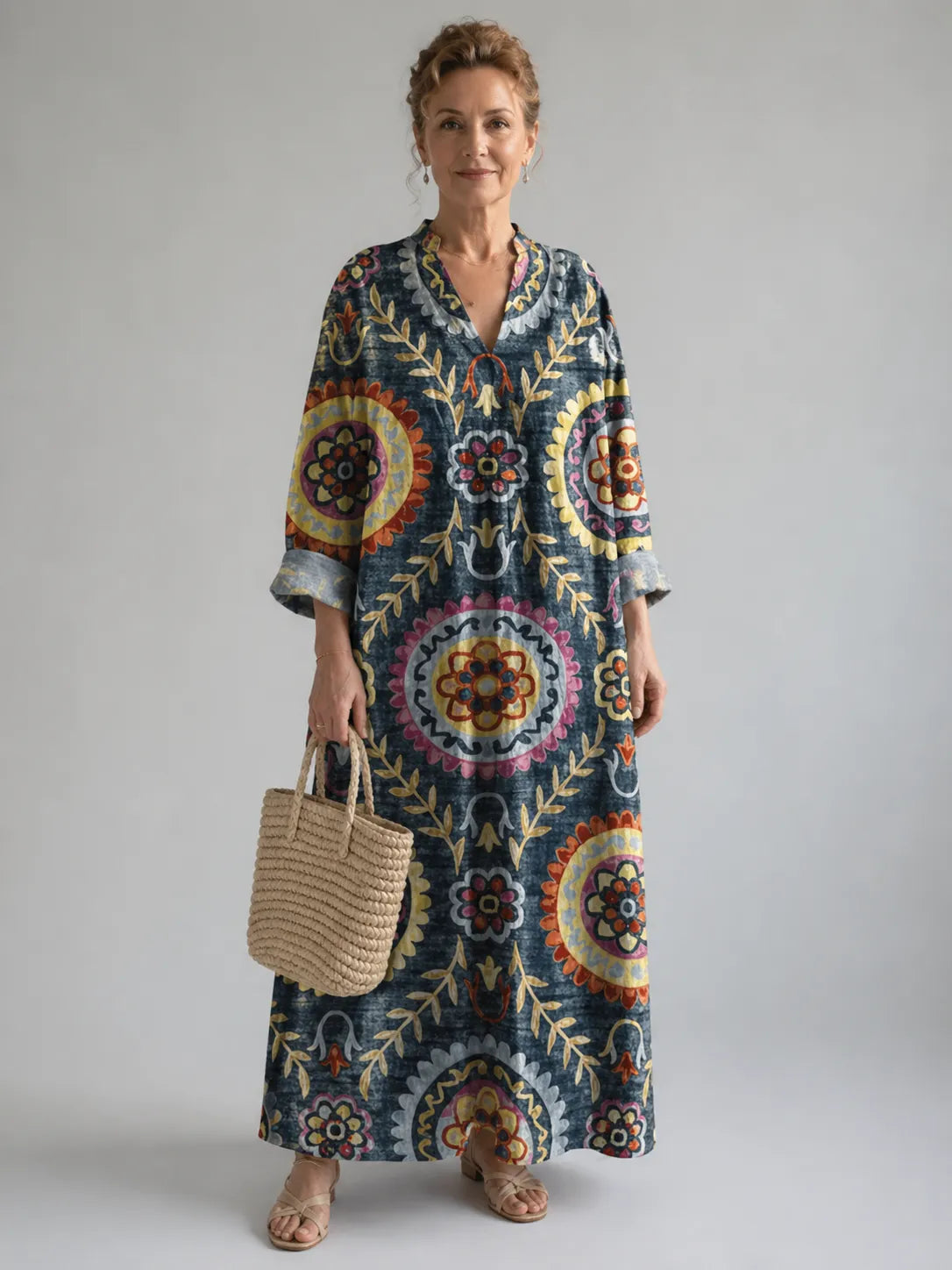 Homixa women's medallion-print V-neck maxi dress, flowing fabric, sleeveless design, and ankle-length style in vibrant pattern.