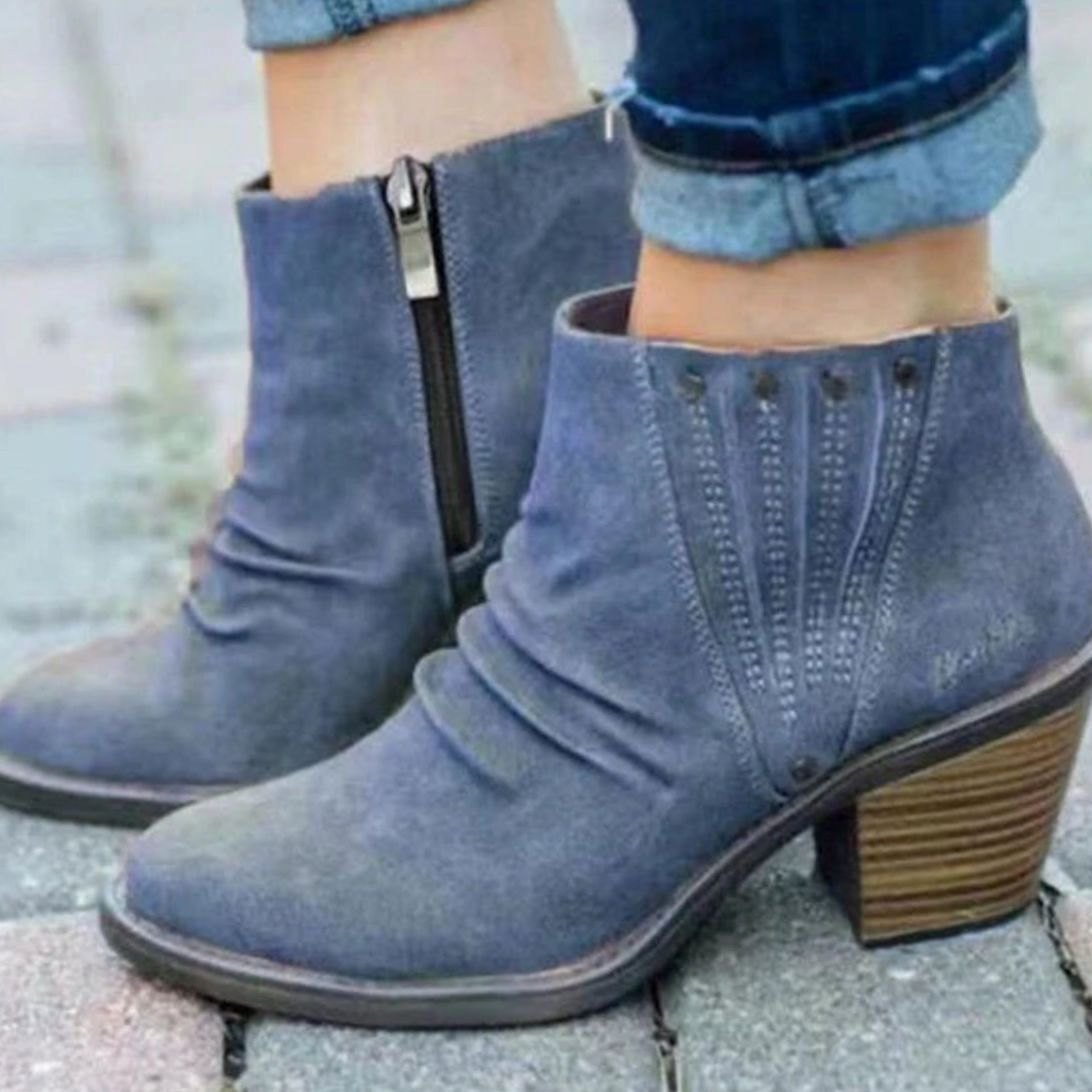 Pair of women's casual faux leather ankle booties with block heels and side zipper from Homixa, stylish and comfortable for everyday wear.