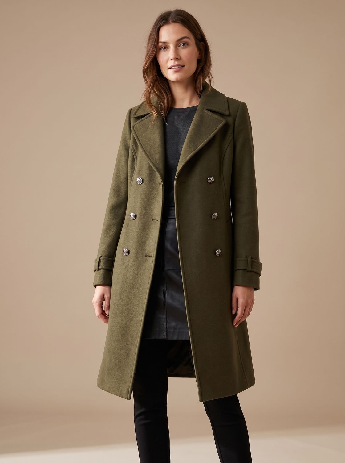 Women's fitted double-breasted wool coat by Homixa featuring a lapel collar and gold buttons, displayed on a model.