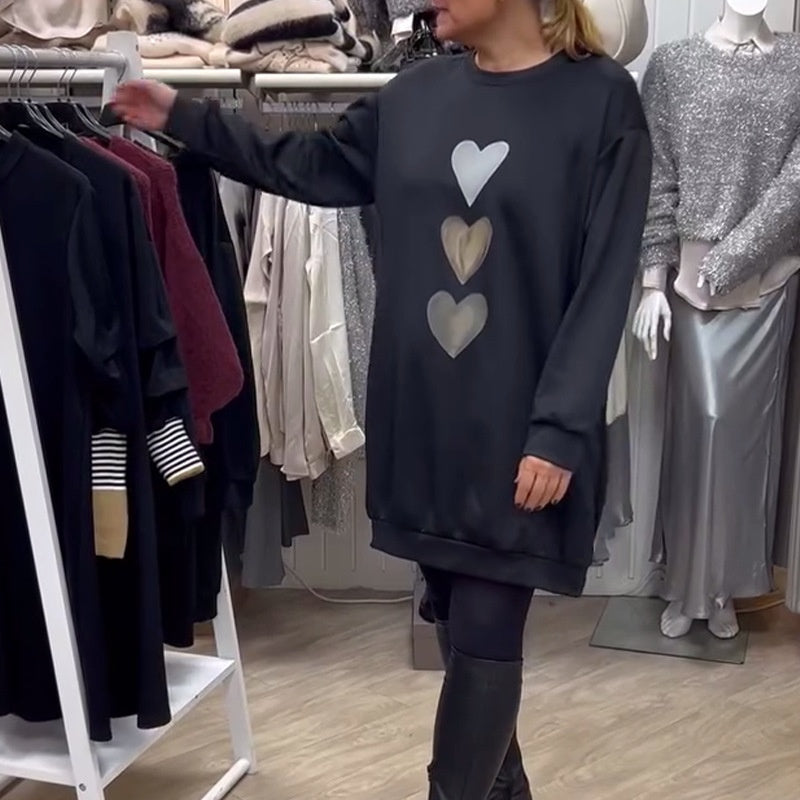 Women's oversized sweatshirt dress by Homixa featuring a stacked heart graphic and ribbed hem, casual and comfortable fashion.