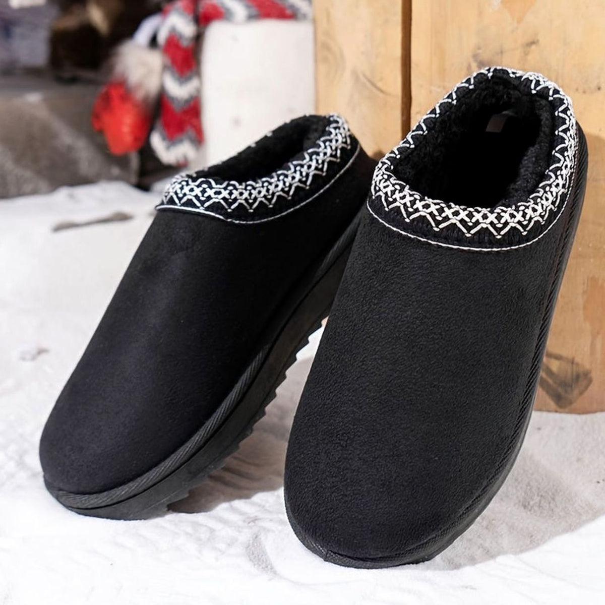 Women’s plush-lined slip-on winter slippers by Homixa featuring boho trim and durable rubber sole for cozy comfort.