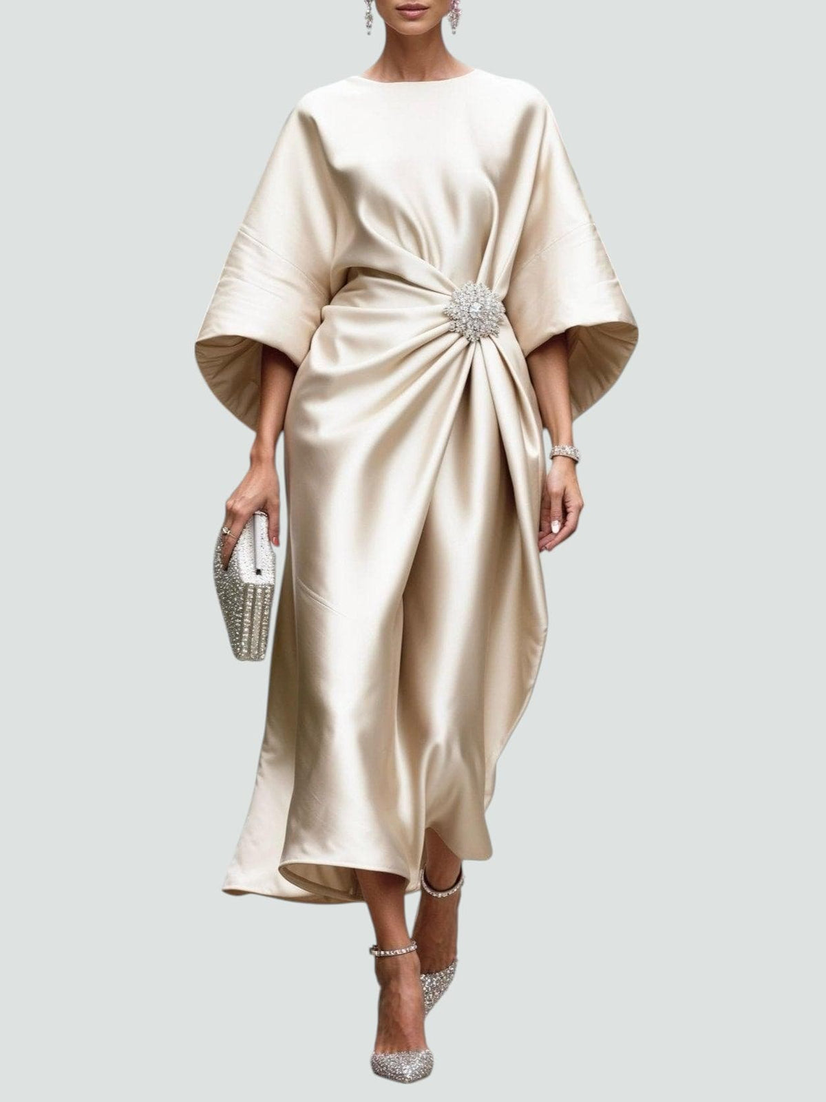 Elegant women's satin evening dress by Homixa featuring twisted design and gemstone embellishments, displayed on a hanger.