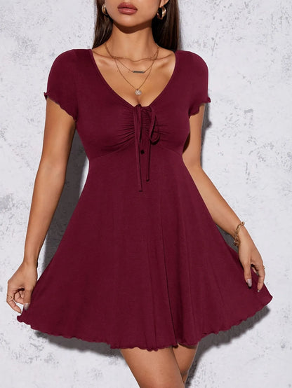 Women’s solid color knit V-neck dress by Homixa, elegant and stylish, featuring a comfortable fit and classic design.