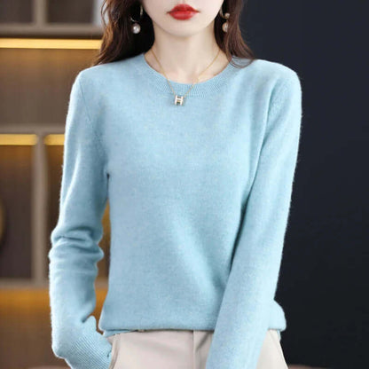 Homixa Belvia women's fine-knit crew-neck sweater with ribbed cuffs and solid color finish, showcasing a cozy, stylish knit design.