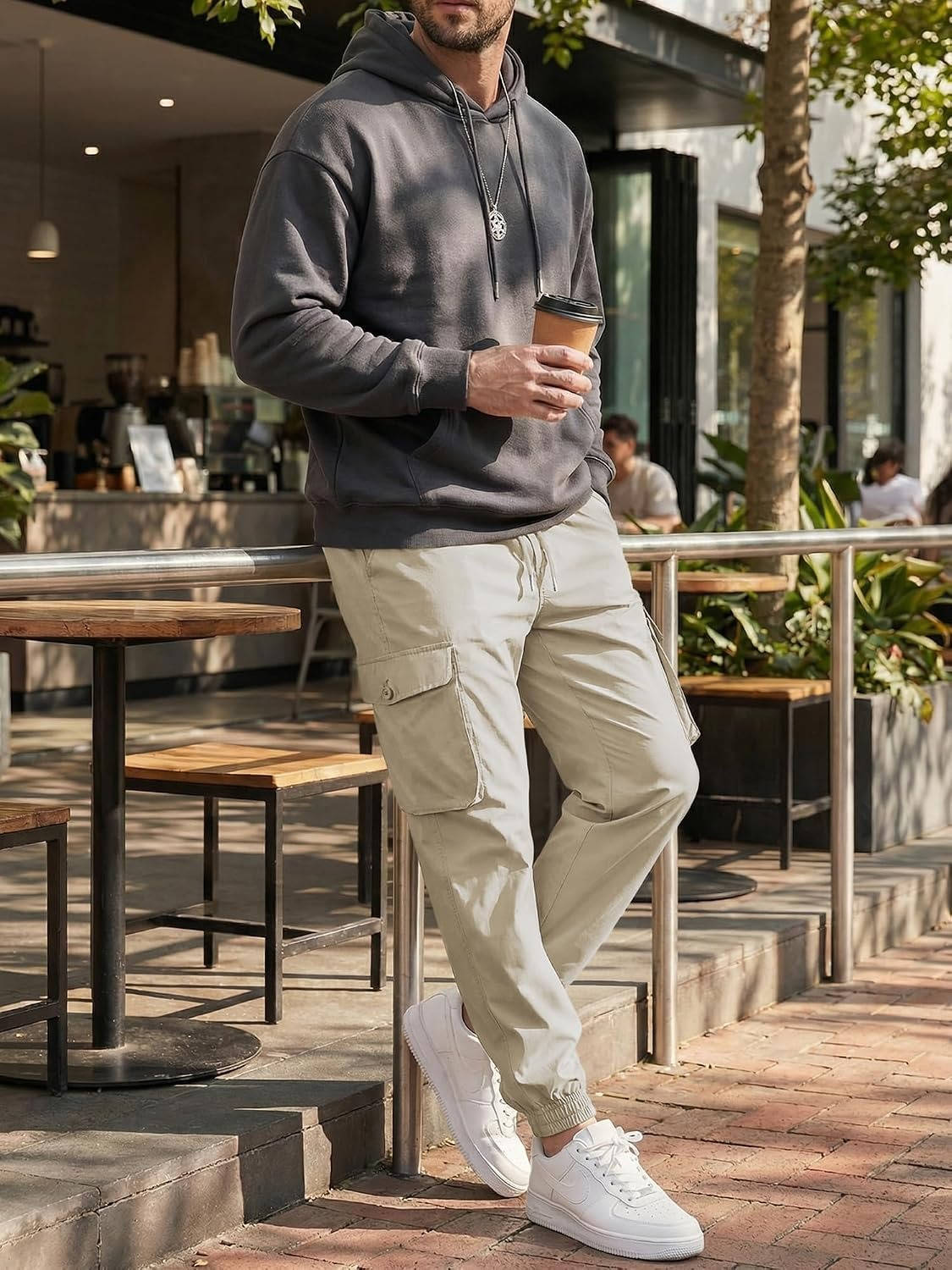 Homixa Belvora men's cargo joggers with drawstring waist, flap pockets, tapered cuffs, casual fit, and durable fabric.