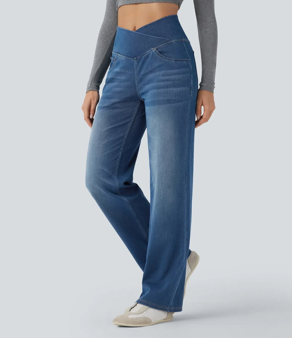 Mercer & Bloom UltraStretch™ crossover high-waisted jeans with tummy control, straight leg fit, and front pockets on a model.