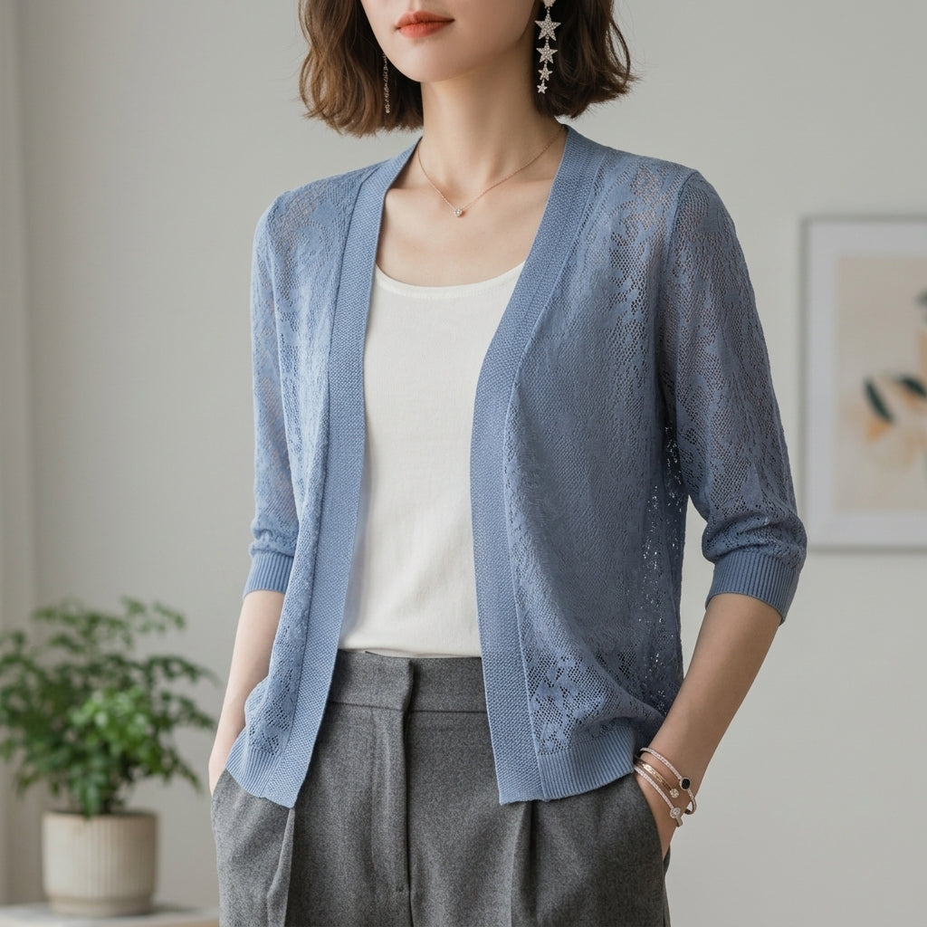 Homixa Benvielle floral lace-knit cardigan with open front, elbow sleeves, and solid trim, showcasing elegant, feminine design.
