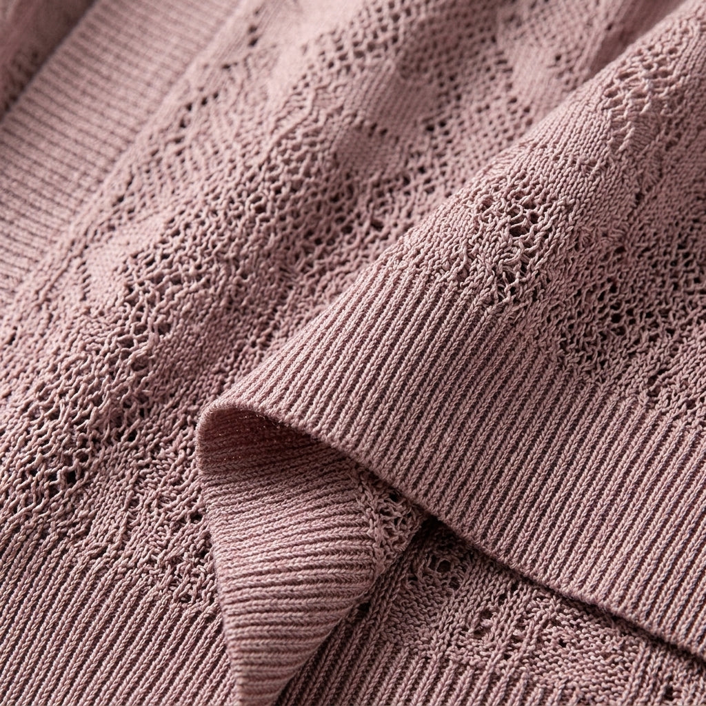 Homixa Benvielle floral lace-knit cardigan with open front, elbow sleeves, and solid trim, styled for an elegant look.