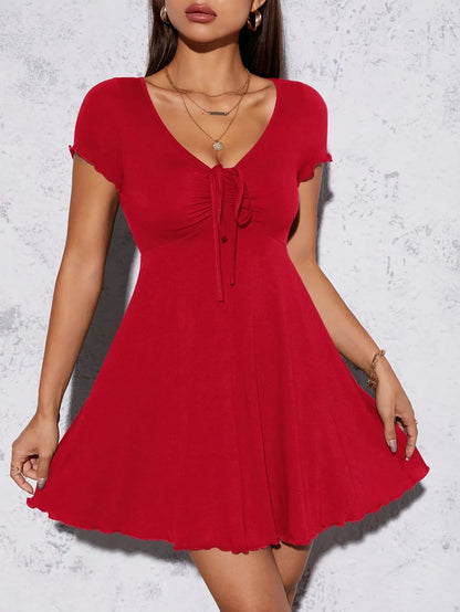 Elegant women's solid color knit V-neck dress by Homixa, featuring a stylish and comfortable design.