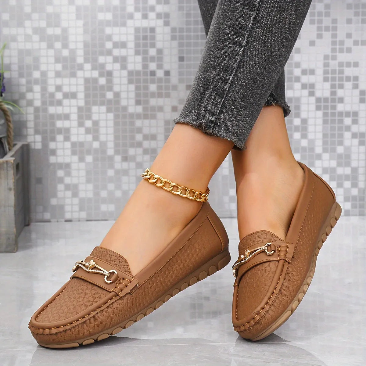 Homixa solid-color moccasin loafers with heart ornament, featuring a comfortable slip-on design in a neutral shade.