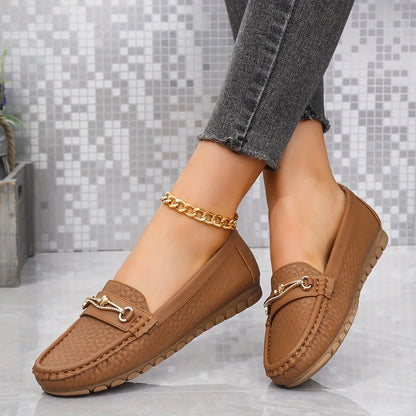 Homixa solid-color moccasin loafers with heart ornament, featuring a comfortable slip-on design in a neutral shade.
