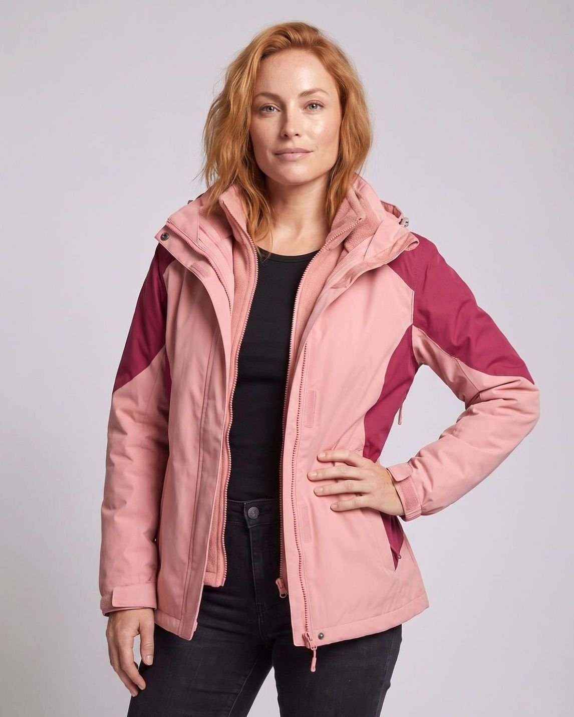 Homixa 2-in-1 polyester softshell jacket with detachable fleece inner layer, hood, and adjustable cuffs for versatile outdoor wear.