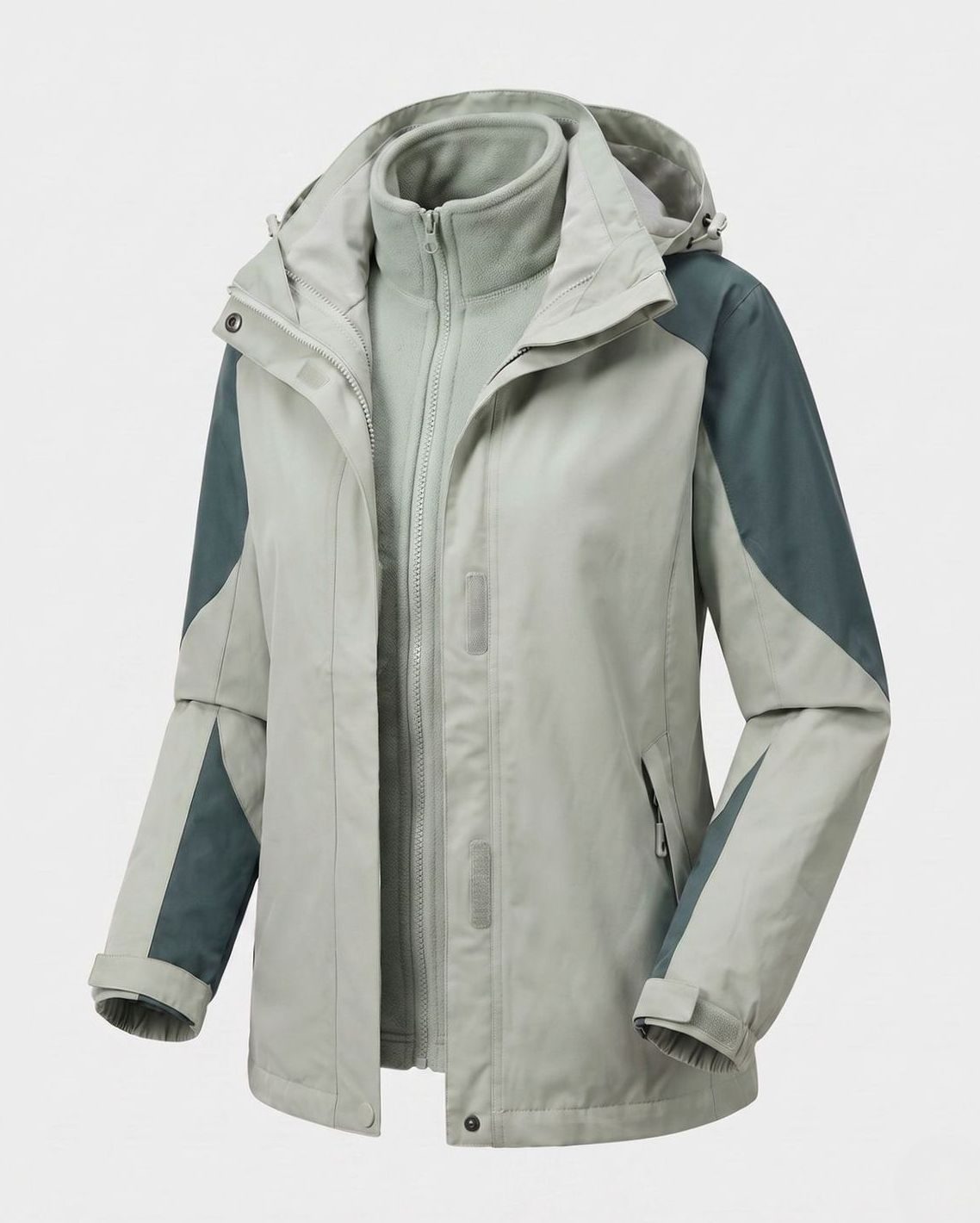 Homixa 2-in-1 polyester softshell jacket with detachable fleece inner layer and adjustable hood, suitable for outdoor wear.