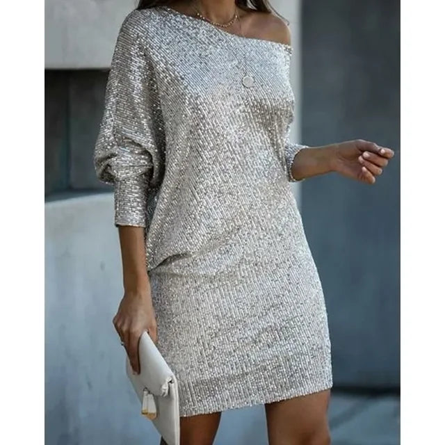 Women's sequin cocktail dress by Emily Carter, slim fit mini dress with long sleeves and off-shoulder design for festive occasions.