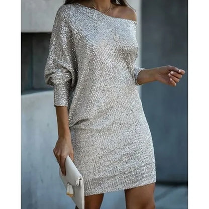 Women's sequin cocktail dress by Emily Carter, slim fit mini dress with long sleeves and off-shoulder design for festive occasions.