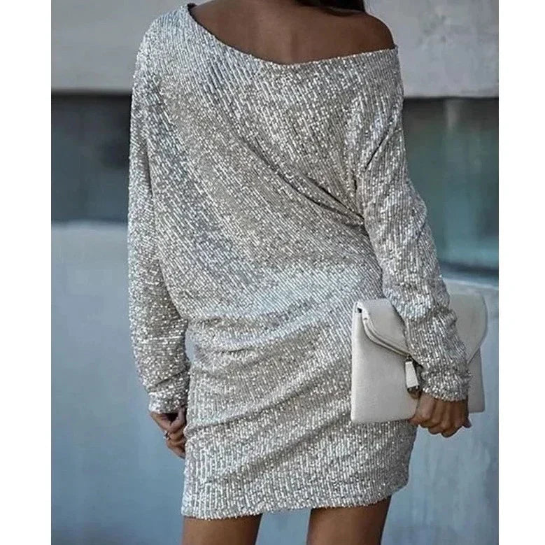 Women's sequin cocktail dress by Emily Carter featuring a slim-fit, mini length, long sleeves, perfect for elegant evening occasions.
