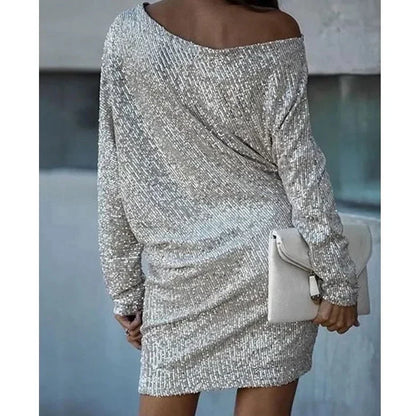 Women's sequin cocktail dress by Emily Carter featuring a slim-fit, mini length, long sleeves, perfect for elegant evening occasions.