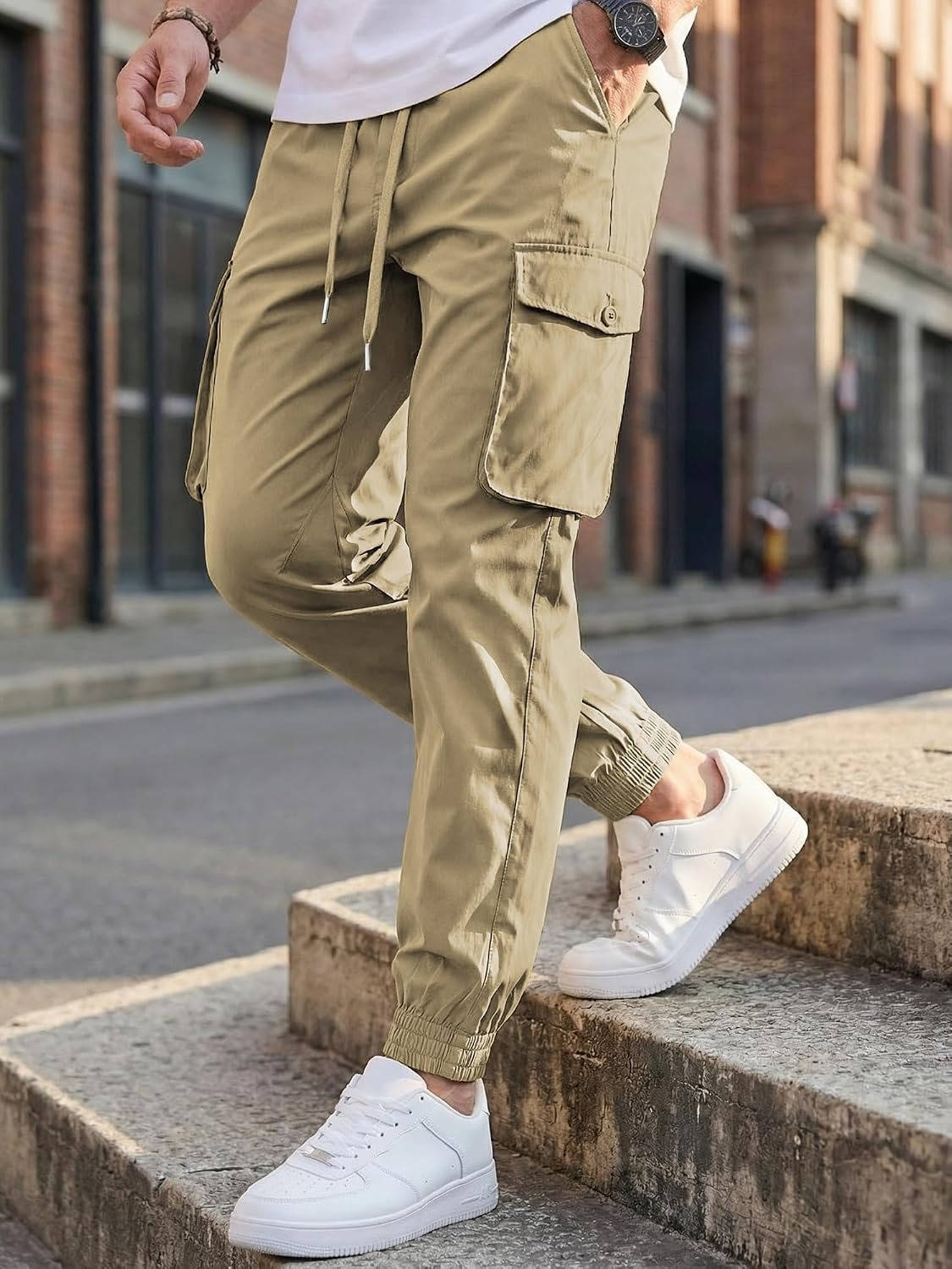 Homixa Belvora men's cargo joggers with drawstring waist, flap pockets, and tapered cuffs, made for comfortable and stylish wear.