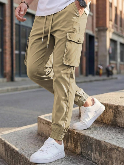 Homixa Belvora men's cargo joggers with drawstring waist, flap pockets, and tapered cuffs, made for comfortable and stylish wear.