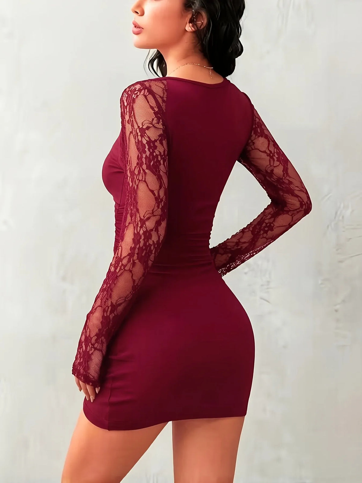 Women's elegant solid color mini dress with lace detail by Homixa, showcasing a stylish and sophisticated design.