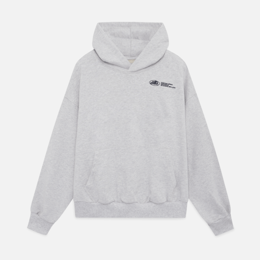 Homixa Avevora women's relaxed hoodie with dropped shoulders, pouch pocket, and ribbed cuffs, displayed on a model.