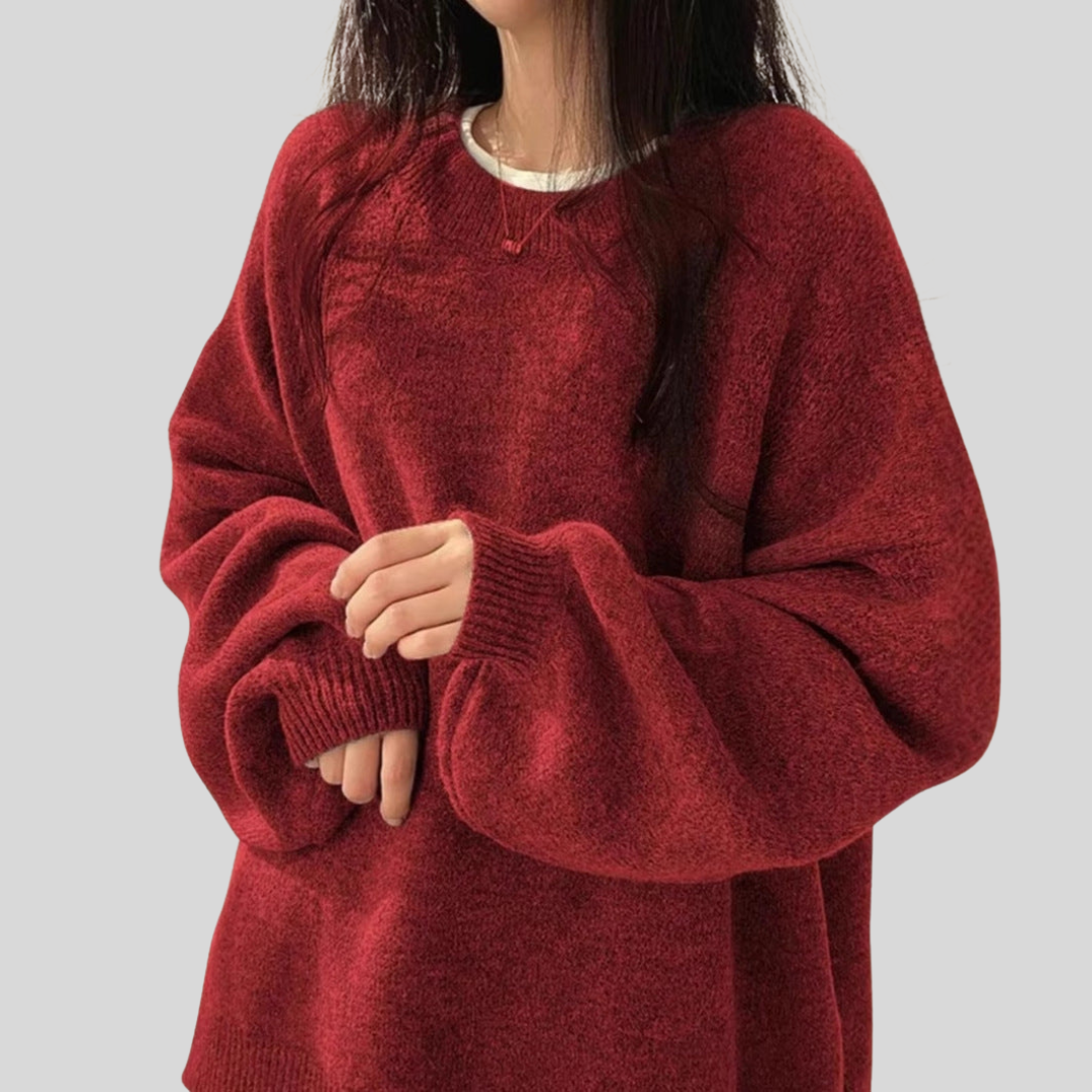 Homixa BILOG oversized knit sweater with crew neck, long sleeves, ribbed cuffs, and solid-color finish displayed in the image.