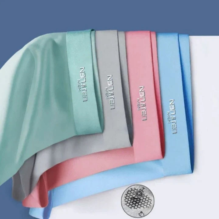 Homixa men's breathable solid-color boxer shorts in a 4-pack with wide waistbands, shown in various colors on a plain background.
